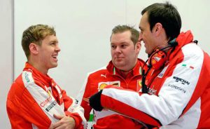 Vettel and some Scuderia Ferrari team members